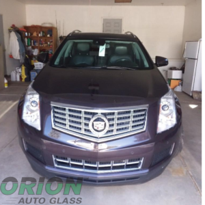 Black cadillac, black car, windshield replacement 