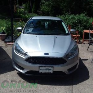 Silver car, Ford, windshield replacement